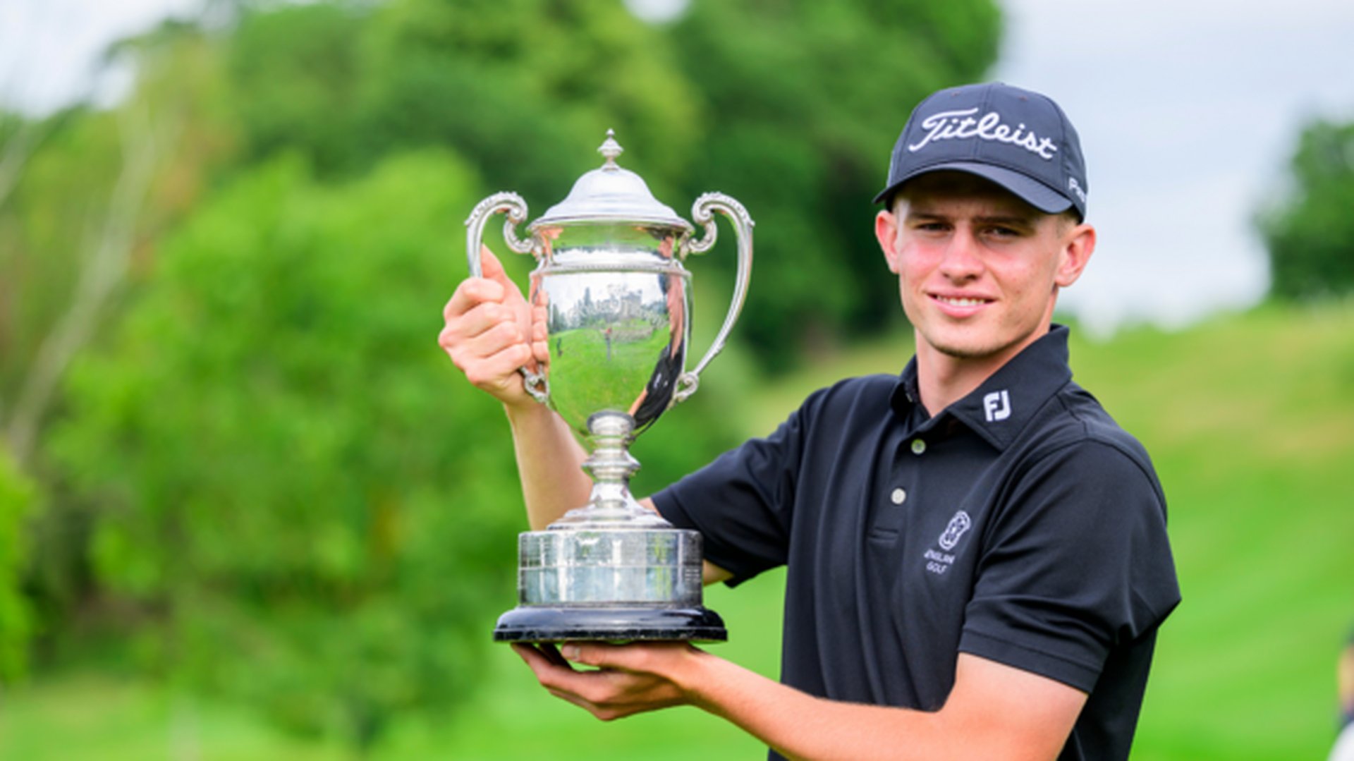 (Credit Leaderboard Photography): Tyler Weaver enjoys the moment at the Carris trophy after sealing the biggest win of his career to date (Credit Leaderboard Photography): Tyler Weaver enjoys the moment at the Carris trophy after sealing the biggest win of his career to date